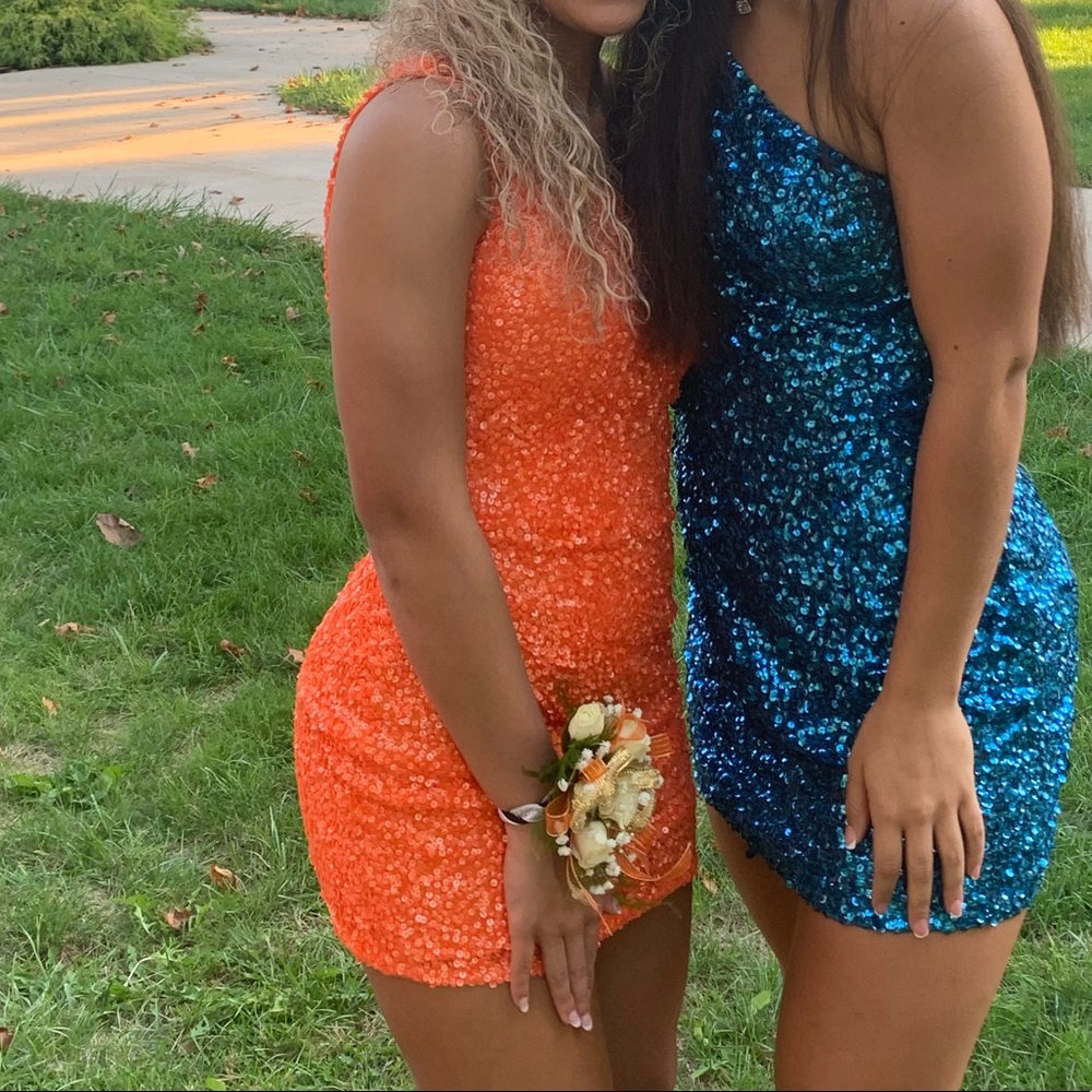 Bright sparkly orange homecoming dress